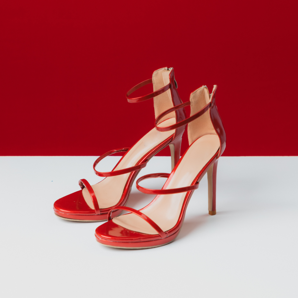red high heels with three straps and a back zipper